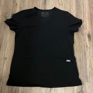 Black FIGS scrub top.